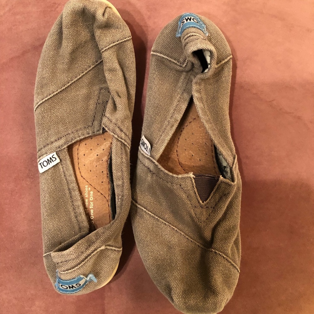 Well loved TOMS gray canvas sneakers